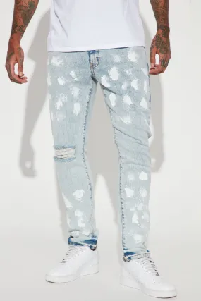 Bleached Distressed Slim Jeans - Light Wash